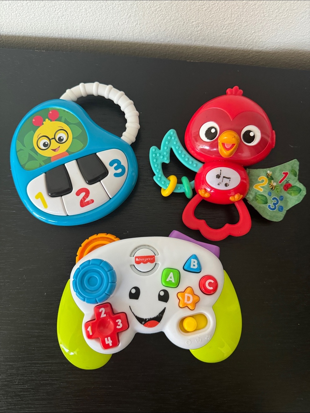 Fisher-Price Colorful Musical Learning Toy Trio - Red, Blue, Green, Yellow